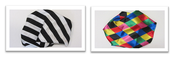 Dues teles contrastades amb dibuixos simètrics: Ratlles blanques i negres / rombes iguals de colors vius